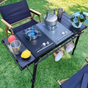 Table IGT pliante hauteur réglable, plateau enroulable